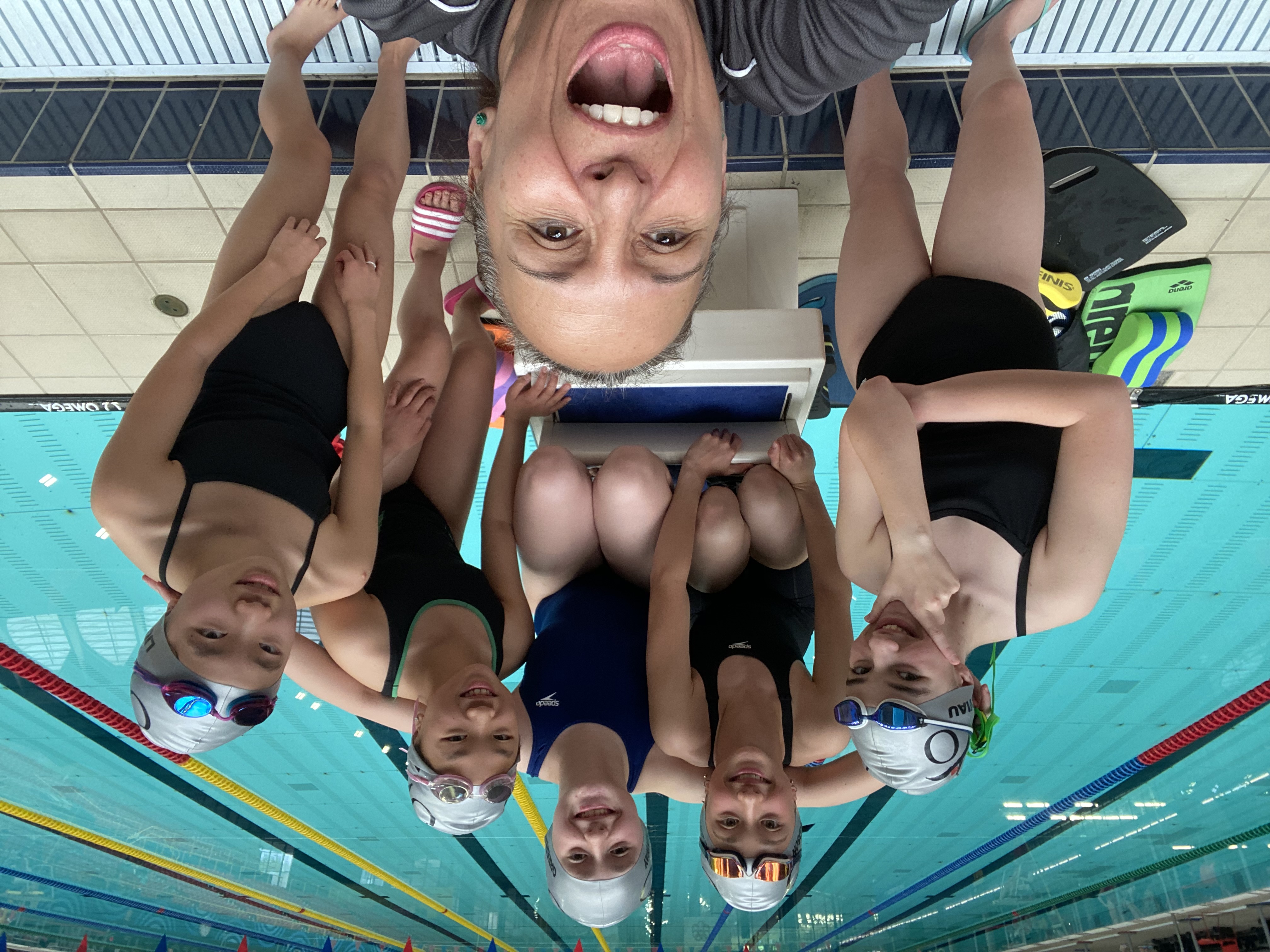 12- swimmers and coach having fun!